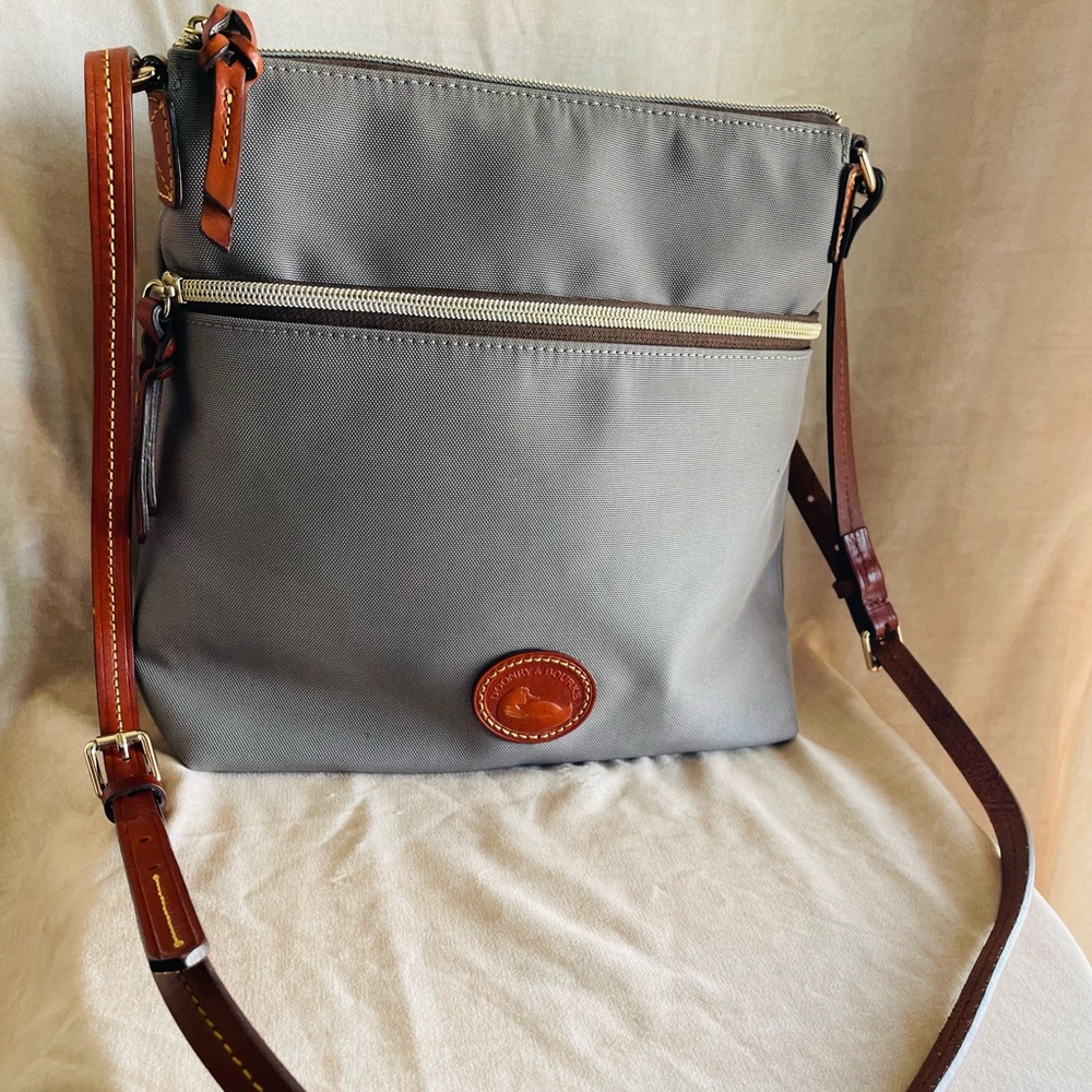 Dooney and Bourke nylon crossbody bags, each sold separately